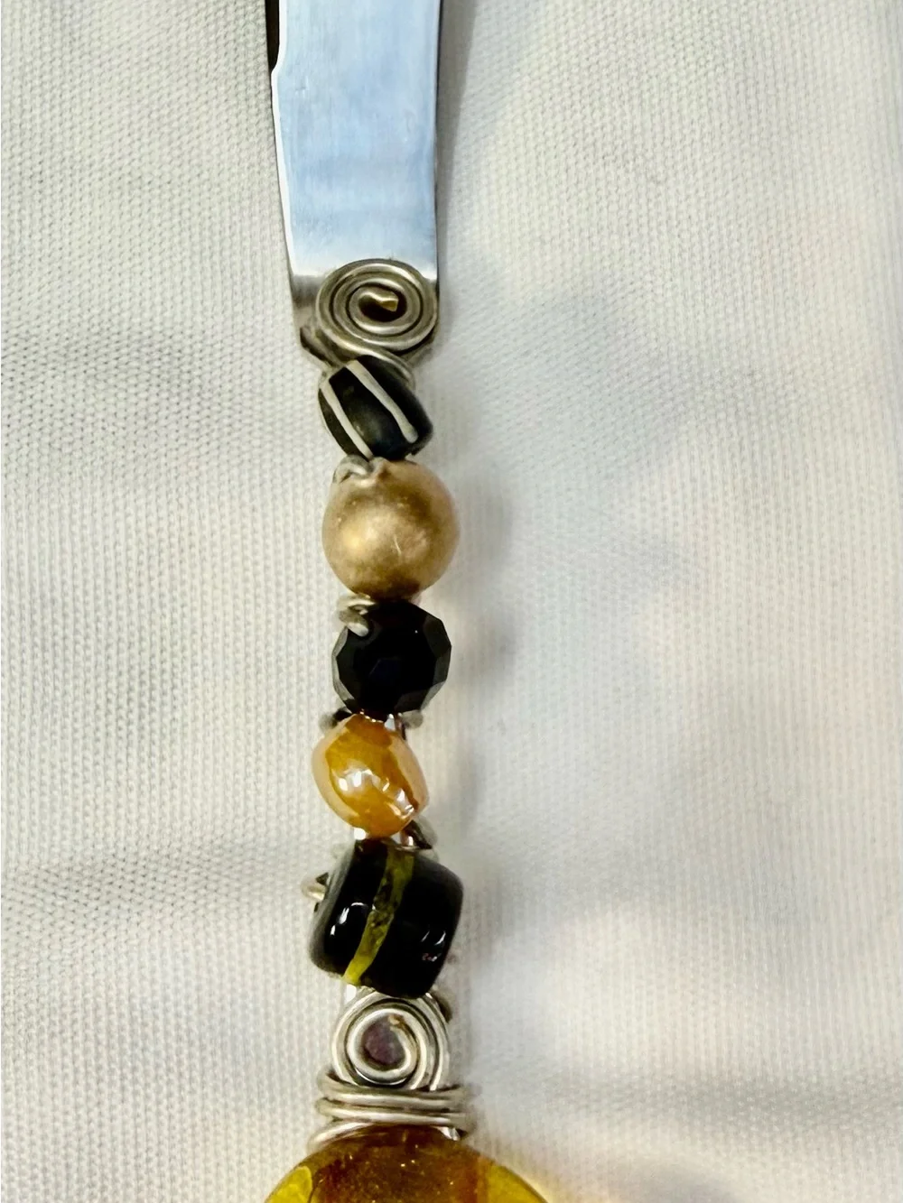 Beaded Butter Knife Featuring University of Iowa Hawkeyes Logo.